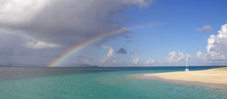 feat buck island beach with rainbow 768x336