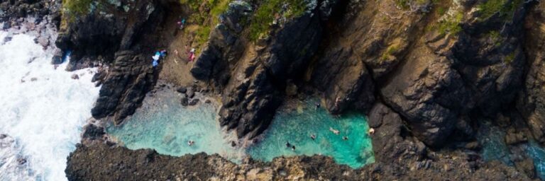 Hero 1920x640 Annaly bay aerial waves 768x256