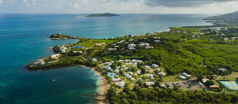 feat christies international real estate bungalows on the bay aerial Copy 768x338